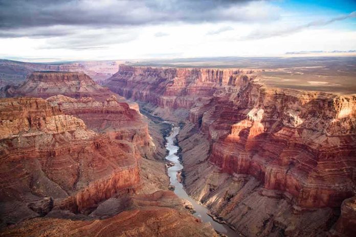 Grand Canyon with river winding through layered red cliffs