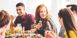friends gathered at a table sharing a meal