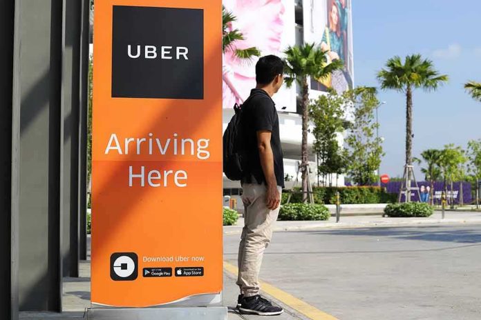 Man waiting at Uber pickup zone
