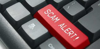 10,000 Americans Were About To Wire Money — Then The FBI Stepped IN Keyboard with red scam alert key