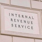 She Wants To Represent Taxpayers — Then MOCKS Paying Like One Internal Revenue Service building sign on a stone wall