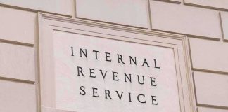 She Wants To Represent Taxpayers — Then MOCKS Paying Like One Internal Revenue Service building sign on a stone wall