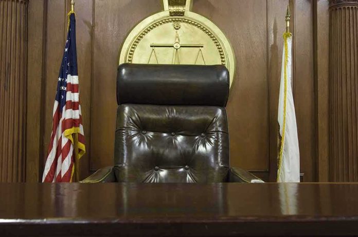 judge's chair in a wooden courtroom