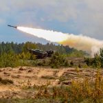 Iran Struck A Ship Carrying Our Troops — Then Came The OFFER rocket artillery launcher firing in a sandy field