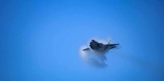 TOP US FIGHTER Makes History! fighter jet creating vapor cone in blue sky