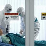 CDC’s Silence Amid Deadly Cruise Ship Outbreak Healthcare workers in hazmat suits treat a patient in a quarantine room
