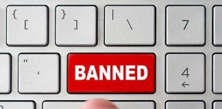 red banned key on computer keyboard