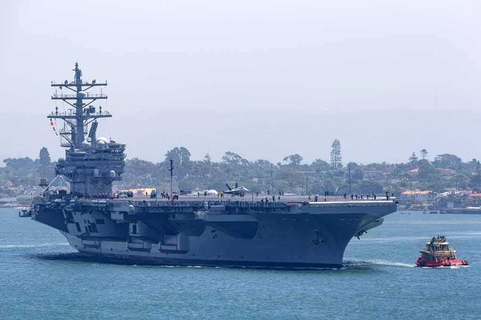 Aircraft carrier escorted by a tugboat in a harbor