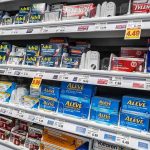 Pharmacy shelf with over-the-counter pain relievers