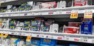 Stomach Bleeds From ‘Safe’ Painkillers Pharmacy shelf with over-the-counter pain relievers