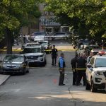 Babysitter EXPOSED — STUNNING Trailer Raid REVEALS PLOT Police officers secure a residential street with patrol cars and yellow tape