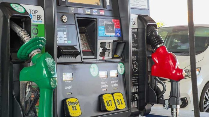Gas pump with diesel and gasoline nozzles