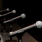 Democrat Candidate DENIED His Own VERIFIED Words Row of microphones on stands at a panel table