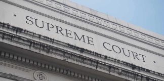 Supreme Court Just BLOCKED What Democrats Tried To Take Away Supreme Court building facade with classical columns
