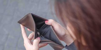 Disaster Victims SHUT OUT — Look Where The Money REALLY Went Hands holding an open empty wallet