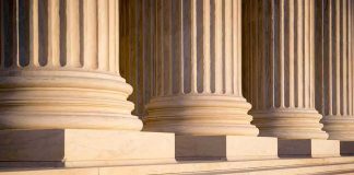 Marble columns with sunlight and shadow on steps
