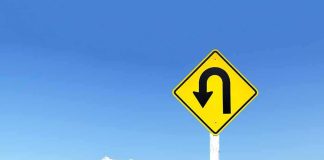 Two House Democrats Campaign On What NEITHER Voted For U-turn road sign against blue sky