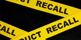 Coffee Maker RECALL: This Common Habit TRIGGERS The DANGER Yellow product recall tape crossing on a black surface