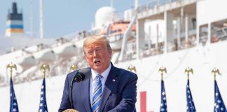 Trump Sends SOME Seniors $90 — See WHO Gets NOTHING Donald Trump speaking at a podium with American flags and a ship in the background