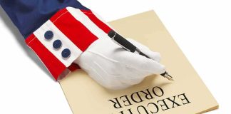 Trump’s EO to Kill CRUSHING Mortgage Fees Uncle Sam costume sleeve signing a document with a pen